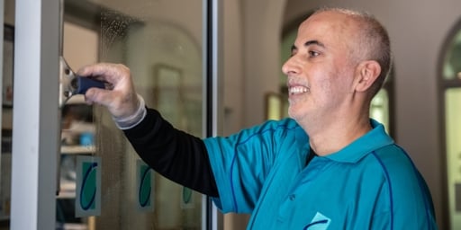 disability employee providing cleaning services to client