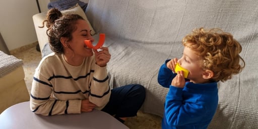 mother playing with son