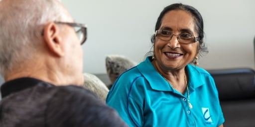 support worker talking to client