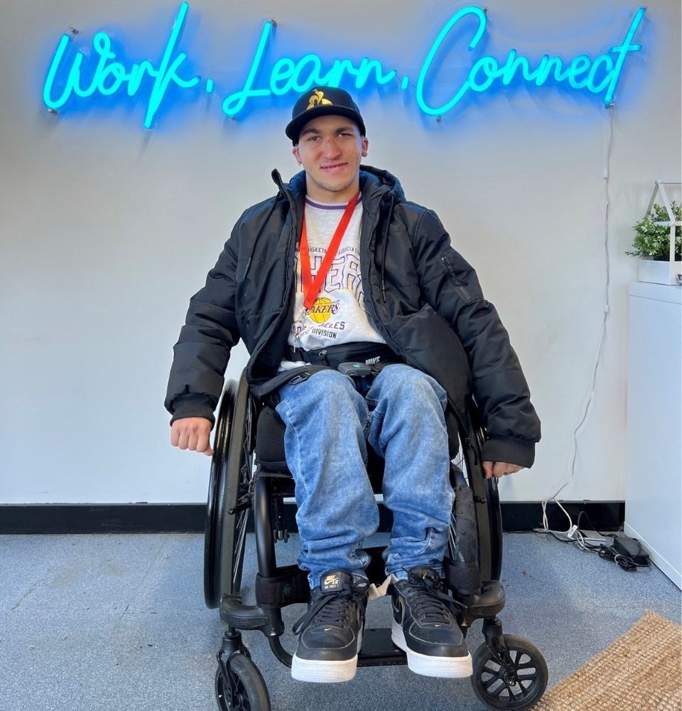 happy disability worker on wheelchair