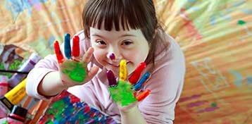 Girl with painted hands